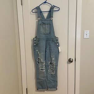 Distressed boyfriend light wash overalls